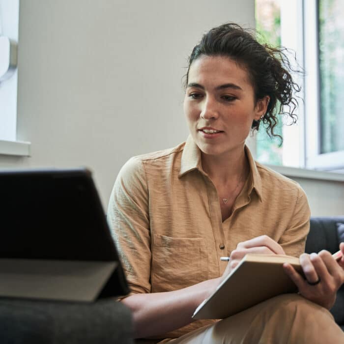 Person getting virtual telehealth with clear recovery center