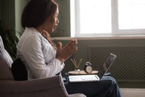 woman-discussing-the-benefits-of-virtual-therapy-at-clear-recovery-center